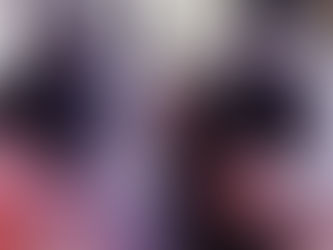 Ollie and Alfie - two grey dwarf rabbits facing the camera.