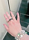 KSLF - Close up of my right hand - rings and bracelet_ silver wire gemstone rings one gree