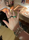 Close up of right hand to show my rings and bracelet. Two silver gemstone wire wrapped ring.