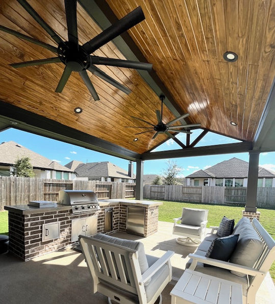 Outdoor living patio with kitchen and concrete countertops
