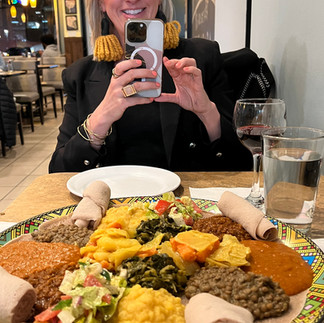 Lindsey Seavert capturing an image while at dinner.