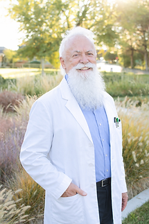 Friendly health coach in lab coat.png