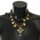 Thumbnail: Dolce & Gabbana Gold Brass Crystal Floral Statement Charms Necklace