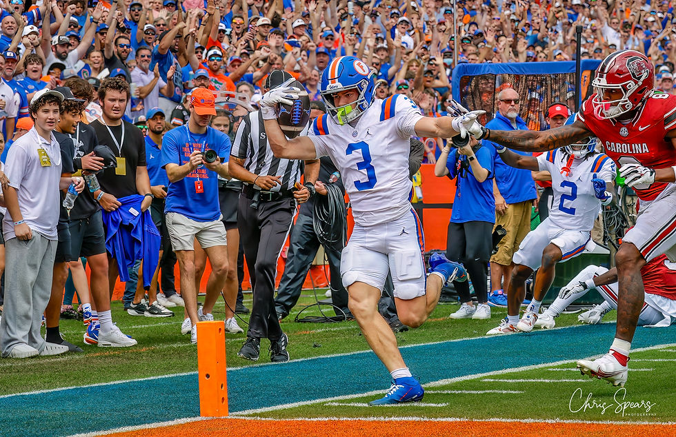 Bailey Stockton (3) stretches for the pylon against South Carolina. Photo by Chris Spears, GatorBait Media.