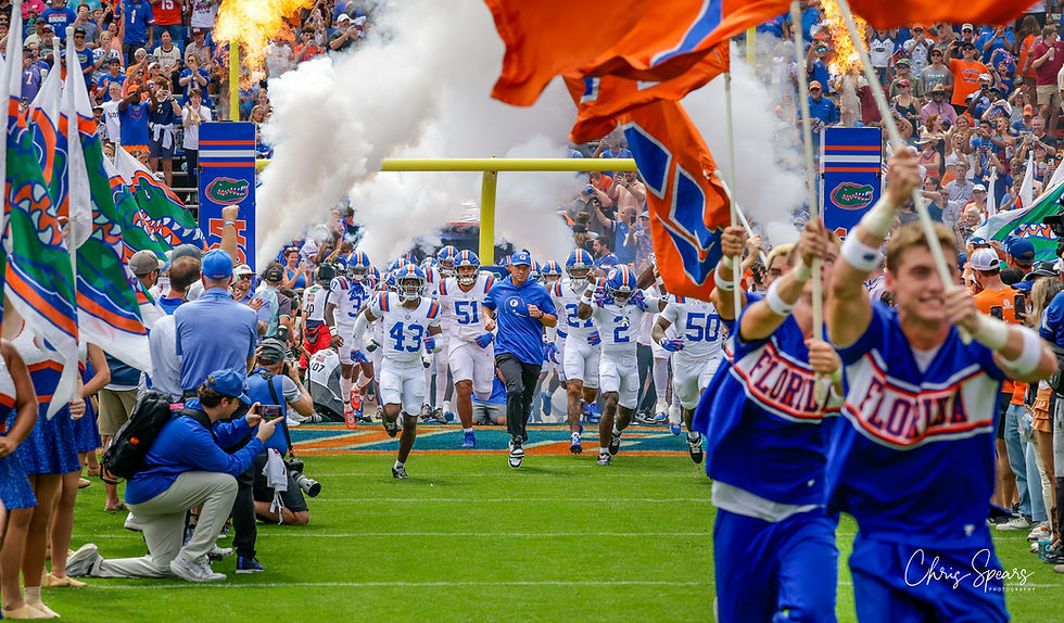 The Gators run out of the tunnel for the 500th game in The Swamp. Photo by Chris Spears, GatorBait Media.