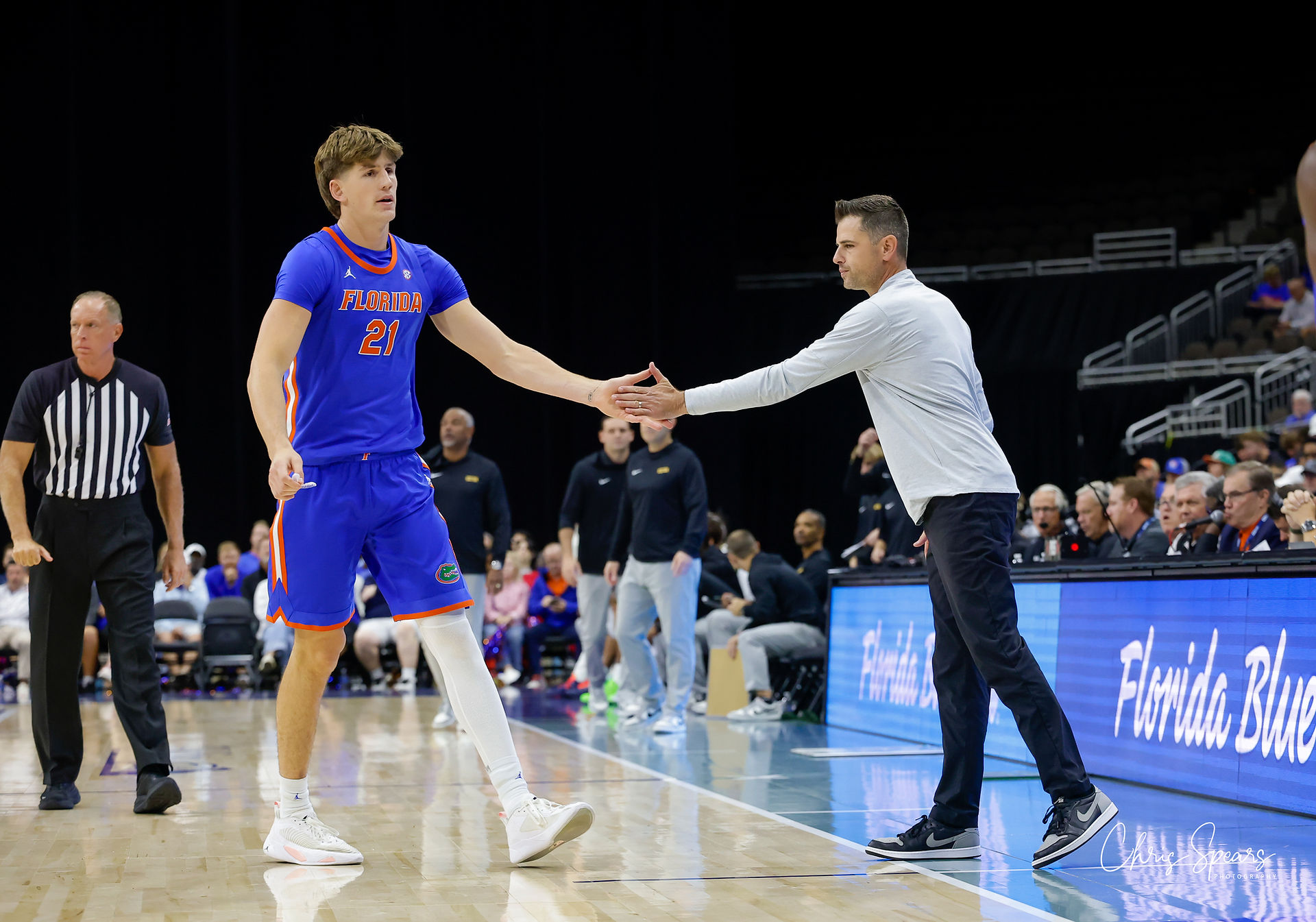 Alex Condon and Todd Golden exchange a hand slap. Photo by Chris Spears, GatorBait Media