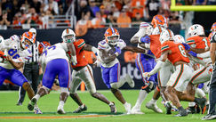 DJ is out of the boot and Napier will continue to call the Gators' plays