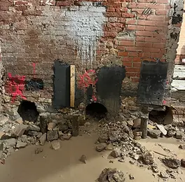 Fori di carotaggio su muratura portante in mattoni pieni per consolidamento strutturale e