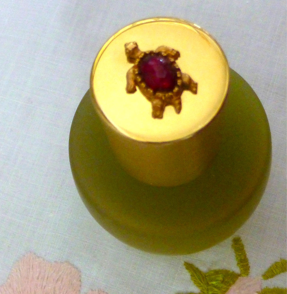 Thumbnail: Rare 1960s Polly Bergen Oil of the Turtle Deep Sea Bath Treatment, 1 oz bottle with frosted glass and jeweled turtle cap