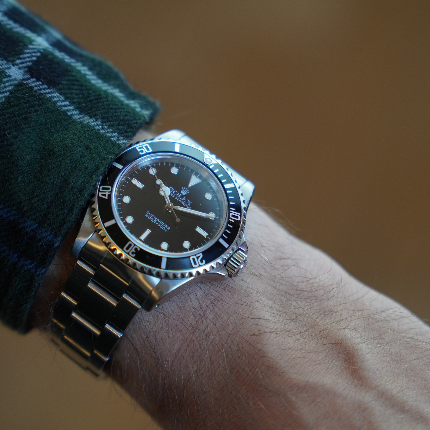     Rolex Submariner 14060 Two-Liner mit schwarzem Zifferblatt und Oyster-Edelstahlarmband – Graf Classics Kreuzlingen