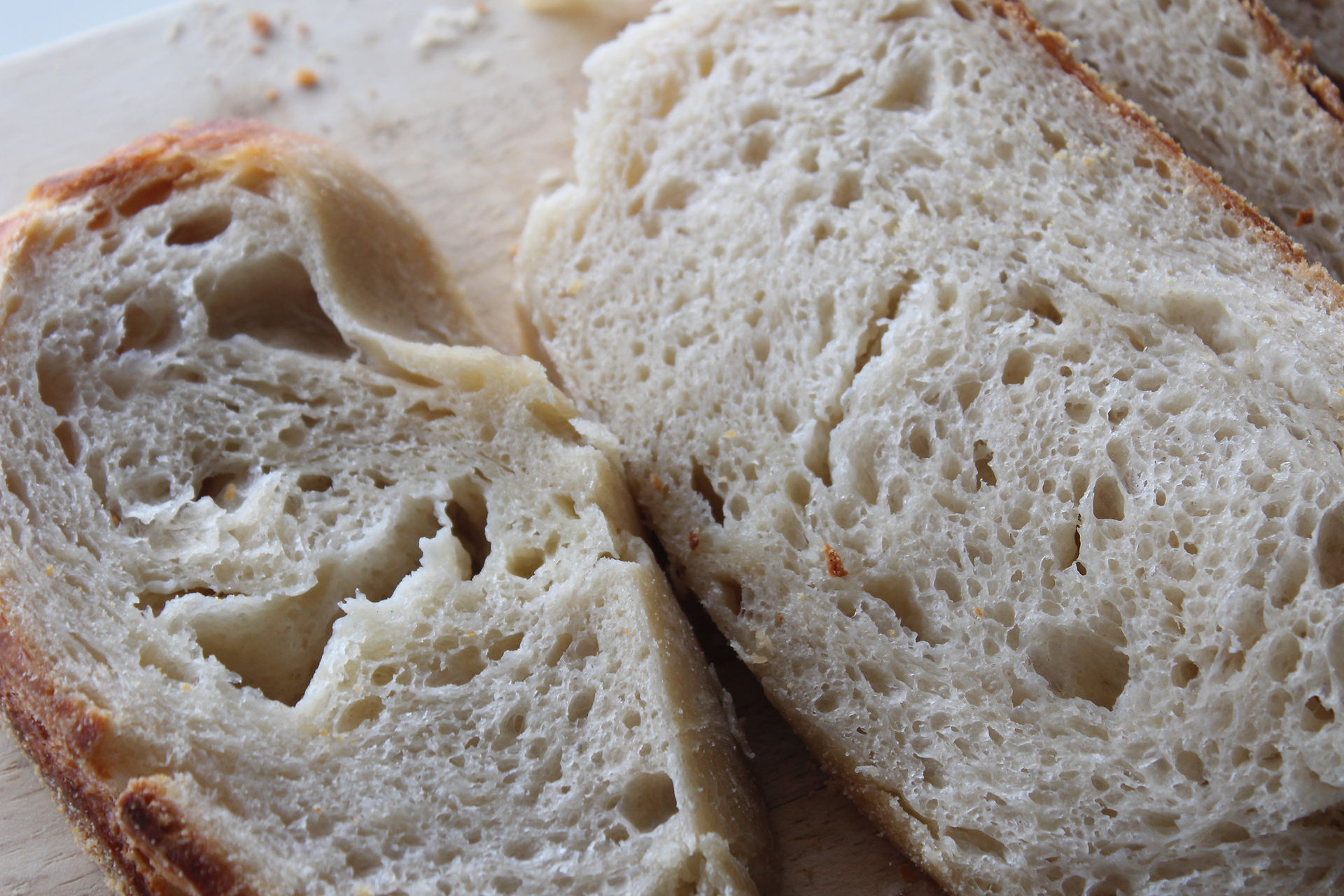 slices of sourdough croissant bread with airy texture and pockets of butter