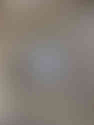 to the beach alla spiaggia sign on tile hung on a rock wall