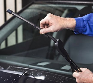 Man changing wiper blades_Getty_resized.jpg