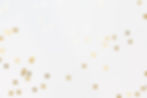 Gold sparkle confetti stars on a white background. Glitter, shine, bright. Christmas festi
