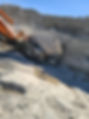 Large saw cutting through Alberta Sandstone at Amico Stone Supply's quarry in Pincher Creek, Alberta