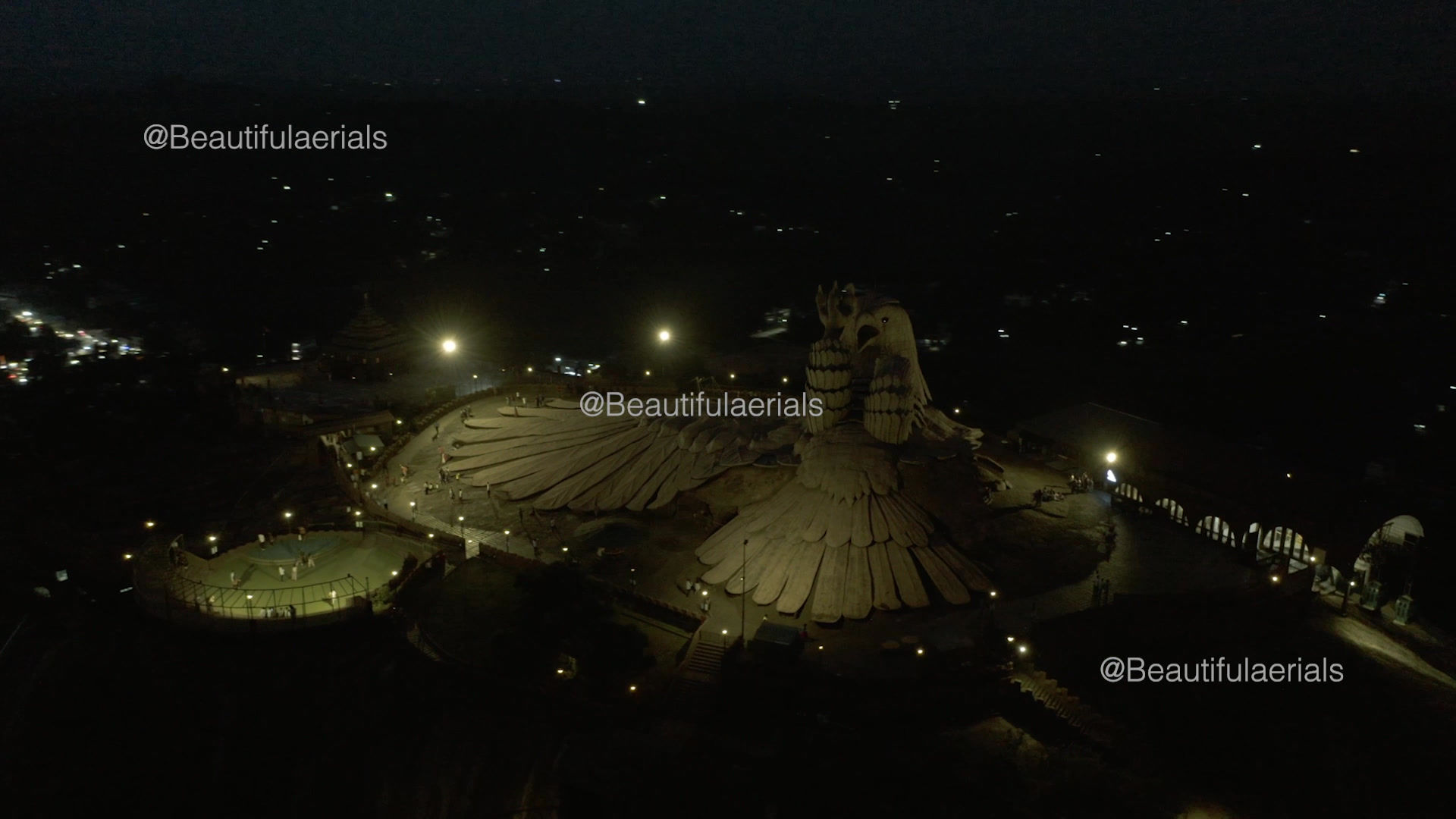 360 drone view of Jatayu Earth’s Center at night, Kerala, India