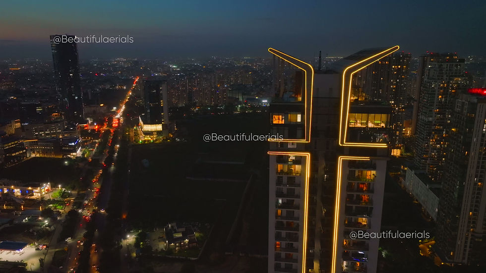 Twilight aerial view of the Golf estate Road with M3M Latitude, M3M IFC, Sec 65