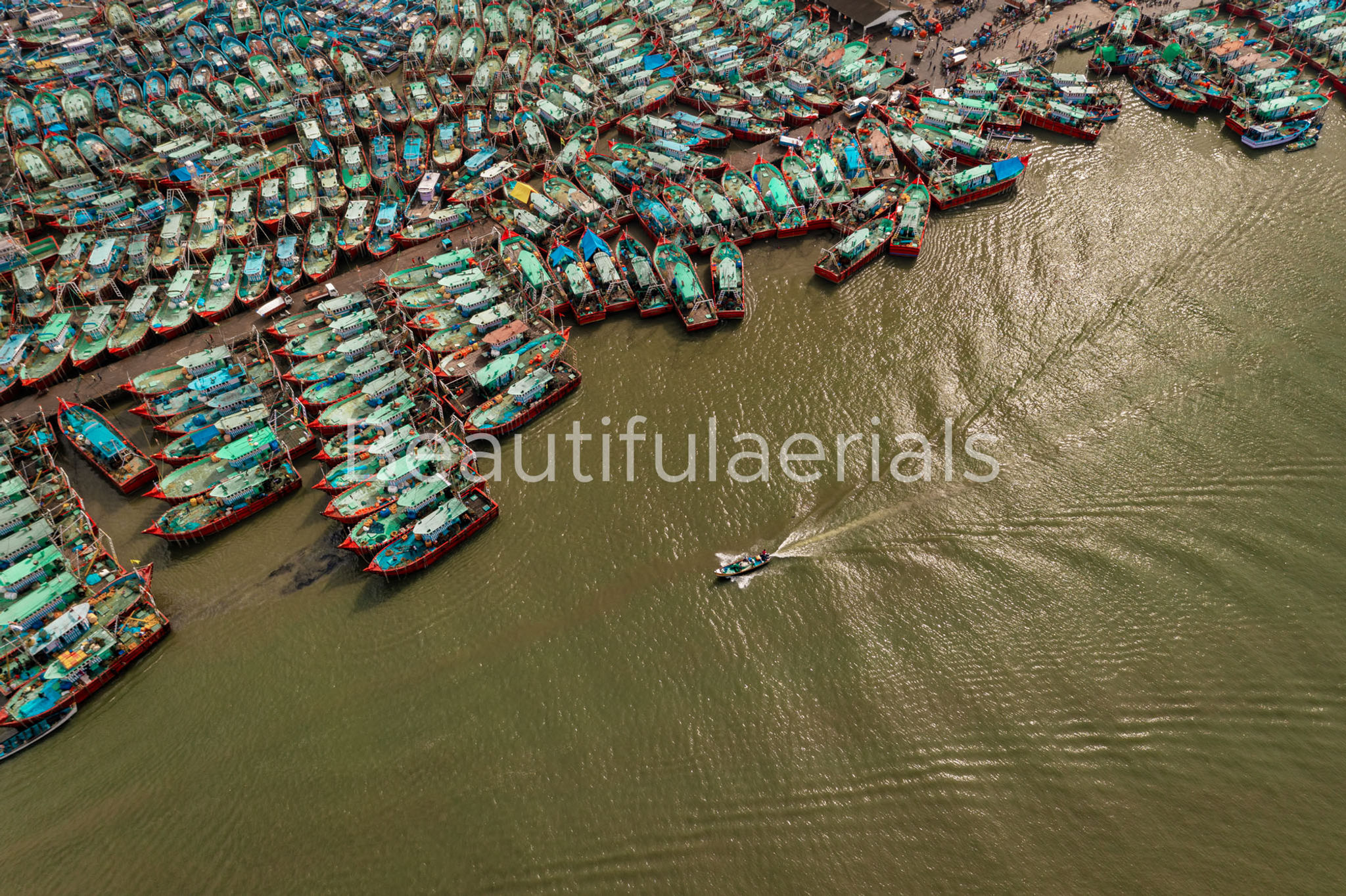 Top Down aerial View of Fishing boats docket in Malpe New Port, Udupi, Karnataka