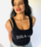 Thumbnail: Woman wearing bra with gold pyramid studs and black tank top, front view.