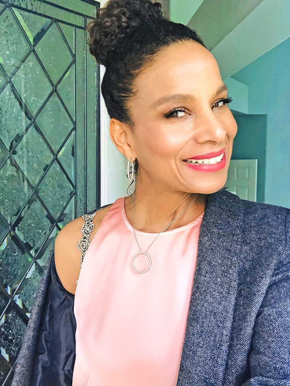 Miniatura: Woman wearing bra with flower straps. Tan lace straps worn with pink tank top and grey tweed blazer, showing one shoulder.
