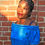 Thumbnail: Woman wearing bra with flower straps featuring blue daisy floral details, in blue denim off the shoulder top.