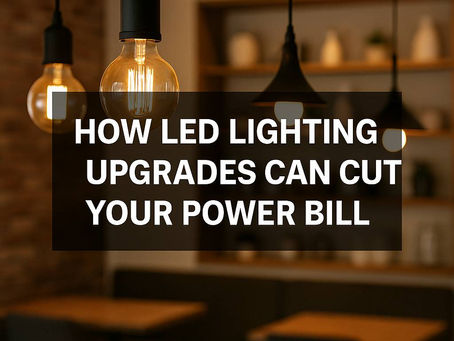 Warm LED pendant lights in a modern New Zealand café, symbolizing energy efficiency and lower power bills.