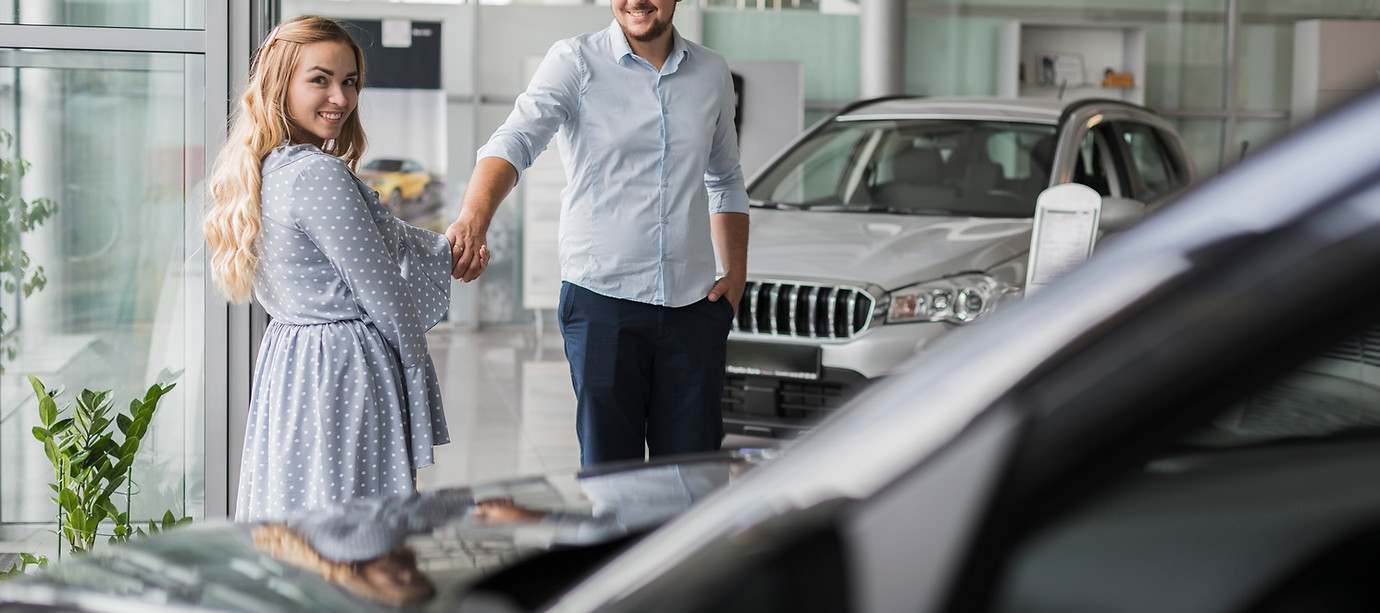 happy-couple-looking-car.jpg