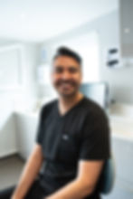 smiling dentist Manny