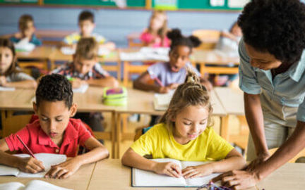 Student receiving educational support from a caring adult