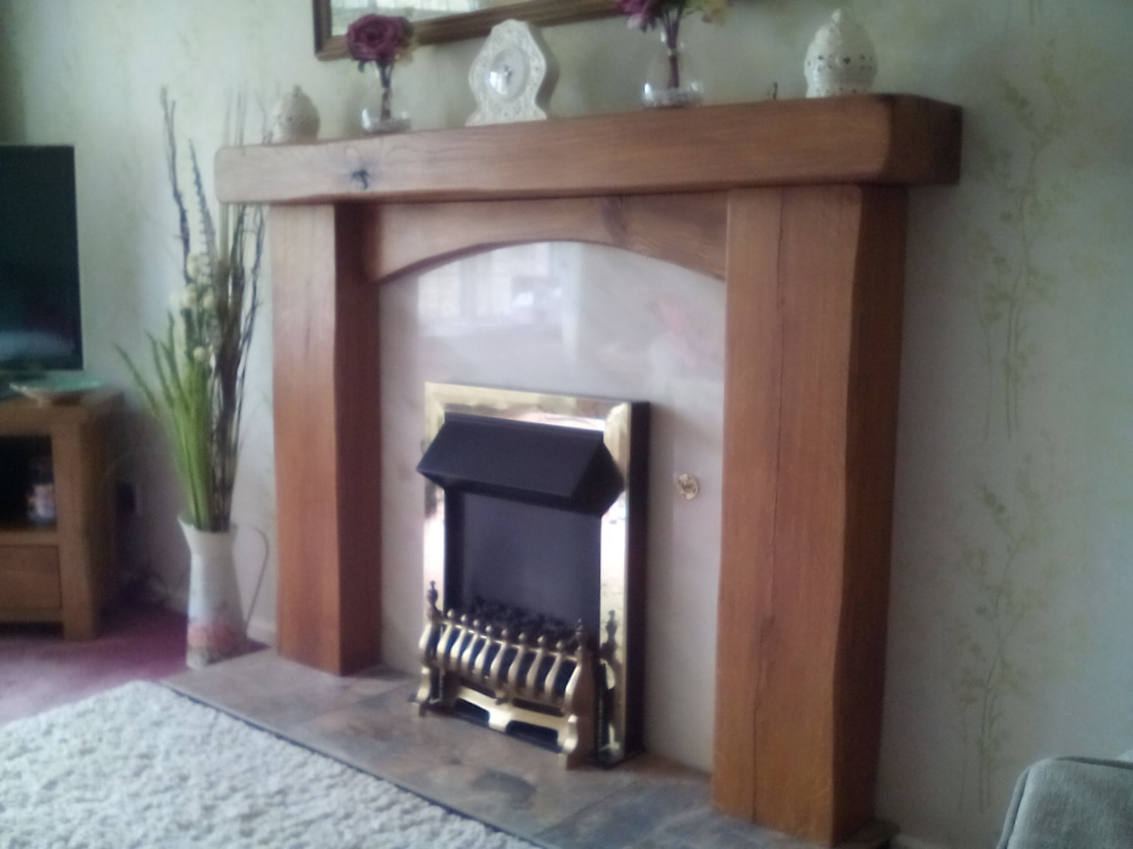 fireplace surround with cross board, danish oil, rustic, edges smoothed out