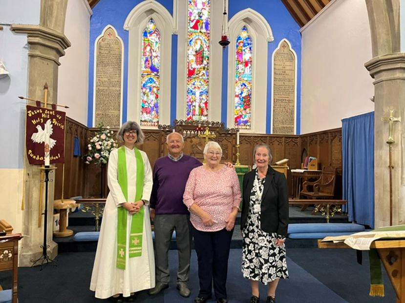 The Revd Hayley Hobbs, Roger and Ann Newman and Liz Kelly after the service