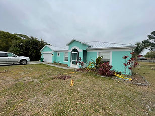 Blue exterior painted by JustinTime Painting in Port St. Lucie, FL.