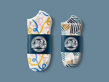 Two Socks Mockup. Simply use the Photoshop layers panel to modify the design, socks, and background color.