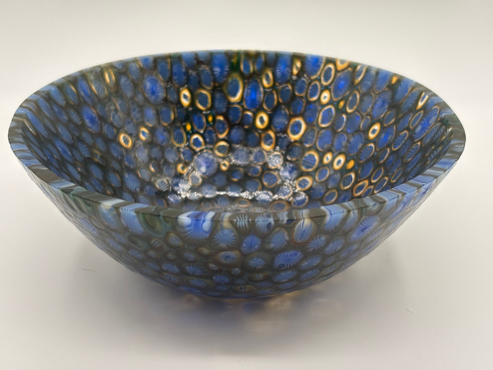 blue murrine bowl with faces