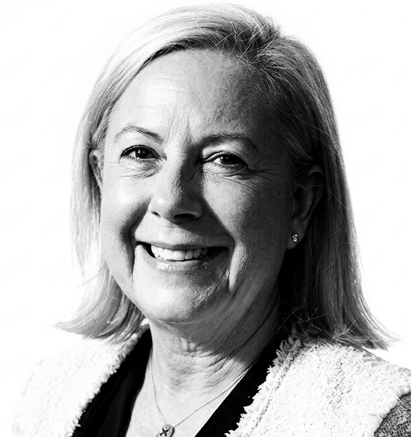 Black & white studio portrait.