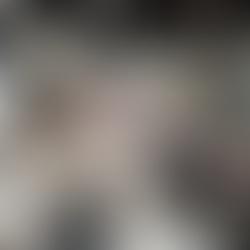 Mixed merchandising using wall displays and tabletop fixtures to highlight different product types.