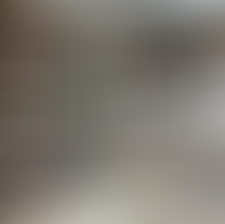 Minimalist retail shelving with a curated selection of products, showcasing how less inventory creates a high-end, intentional shopping experience.