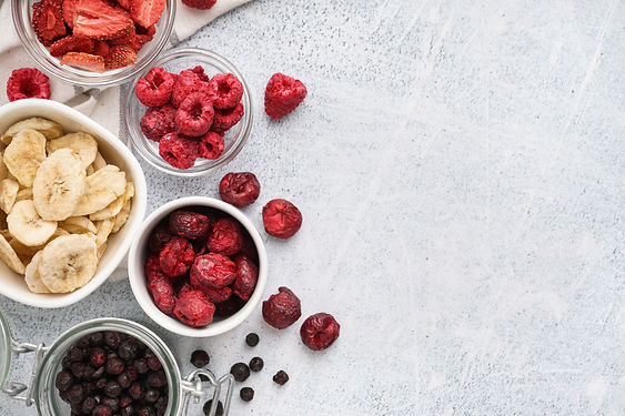 Composition with different freeze-dried fruits on light background.jpg