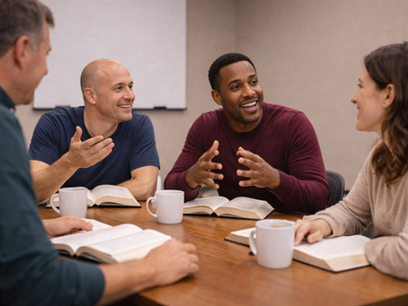 Adults discussing the Bible