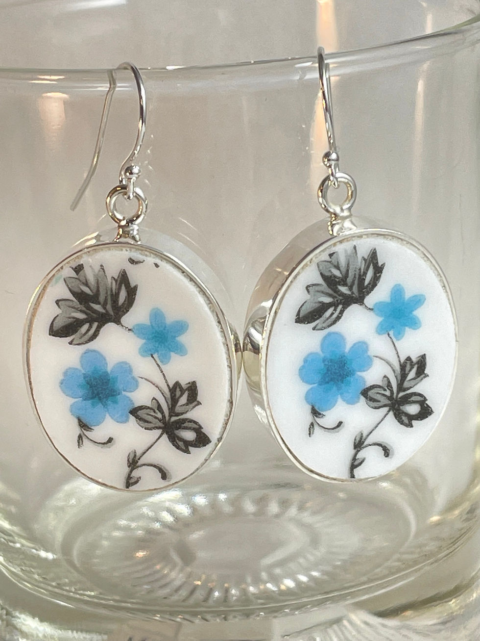 Made in China SH, small blue flowers, oval china earrings