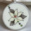 Thumbnail: Salisbury Bone China 'Flannel flowers' round pendant with white flower