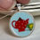 Thumbnail: round pendant with red tea pot and green tea cup
