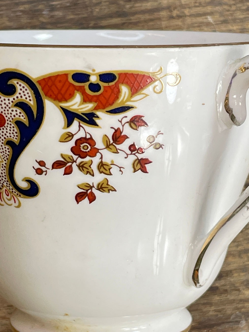 Thumbnail: tea cup with red flower decoration