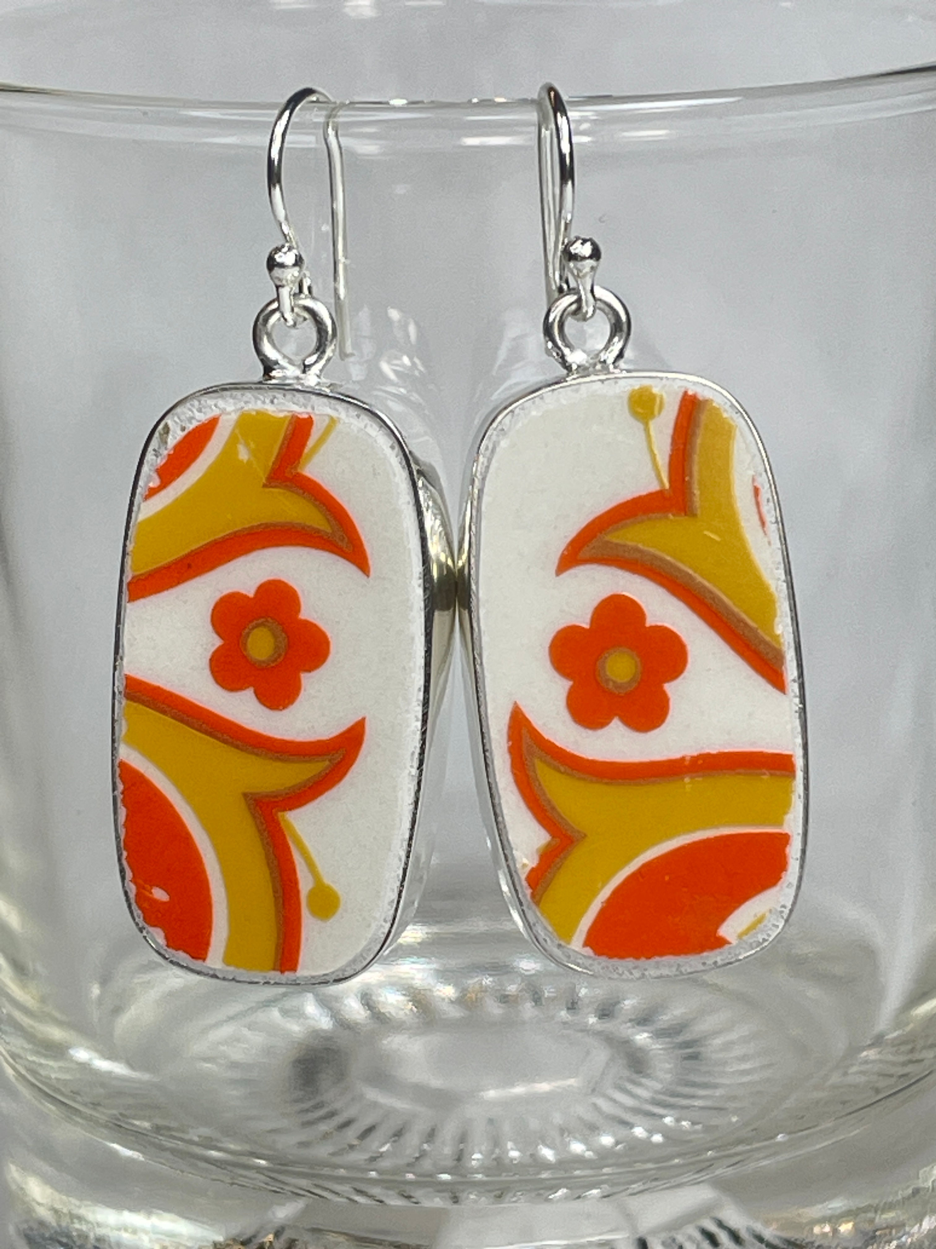 1960's funky orange earrings of vintage china