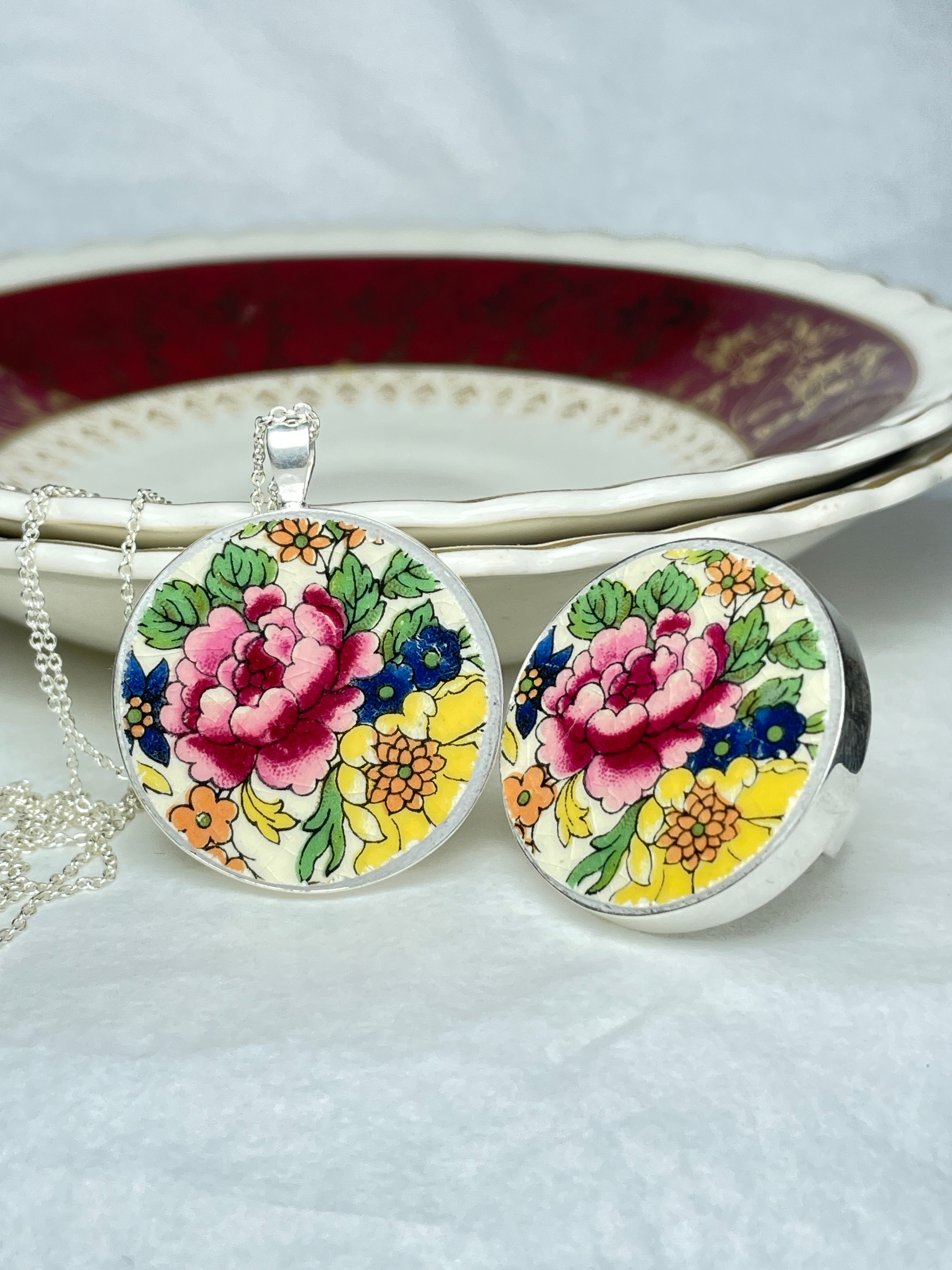 pair of matching floral ring and pendant
