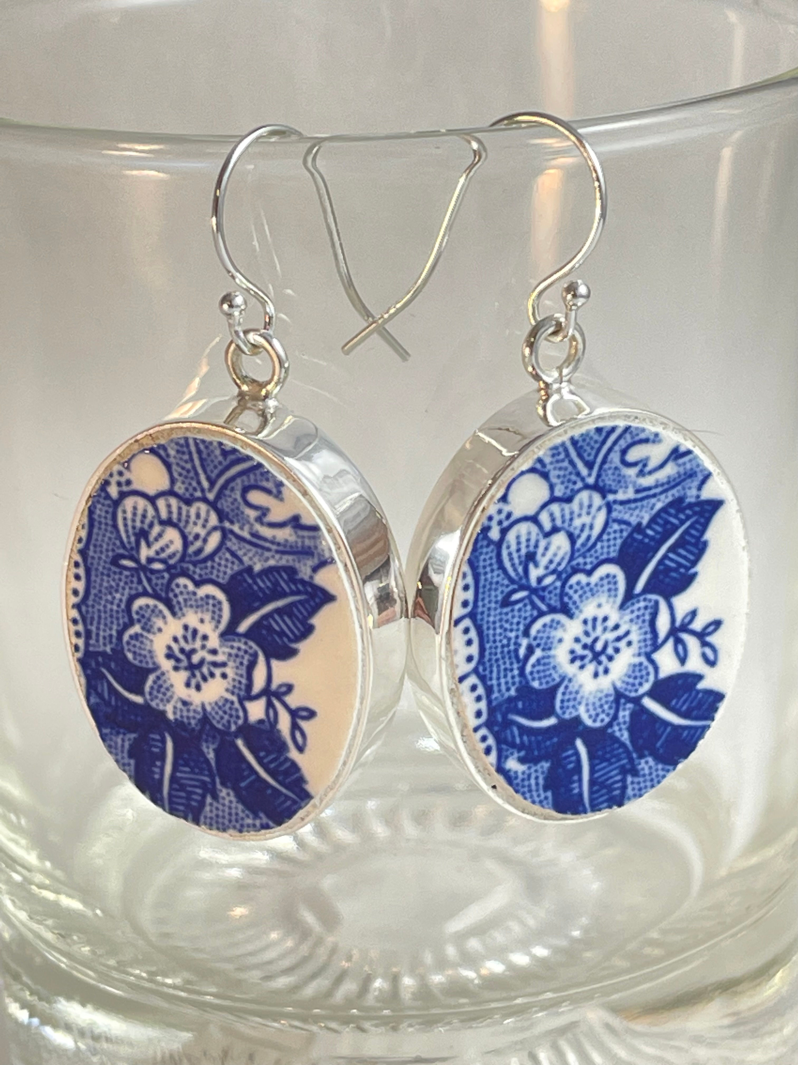 blue and white pattern earrings