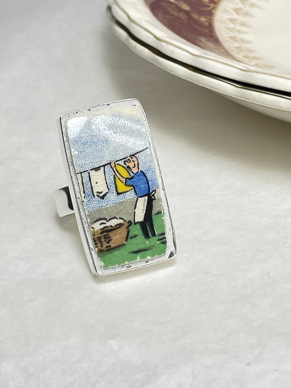 Thumbnail: Lord Nelson by Elijah Cotton, 'Man with washing', rectangle vintage china ring