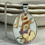Thumbnail: Royal Doulton Bunnykins, 'The Red Nose Bunny" oval modern china pendant