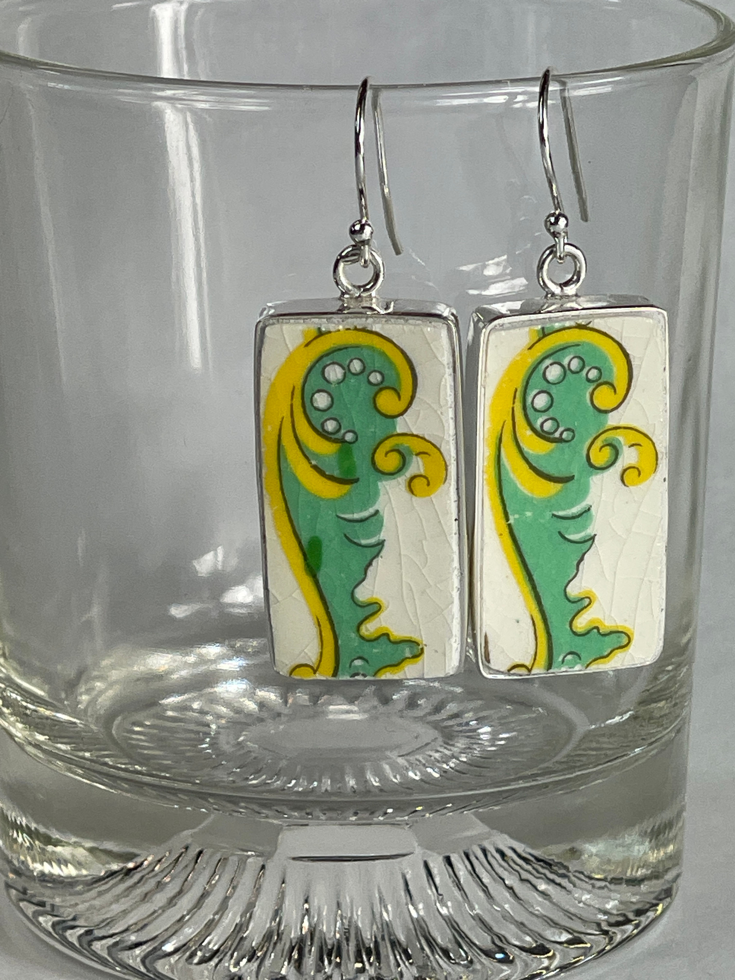 rectangle drop earrings with a green and yellow swirl