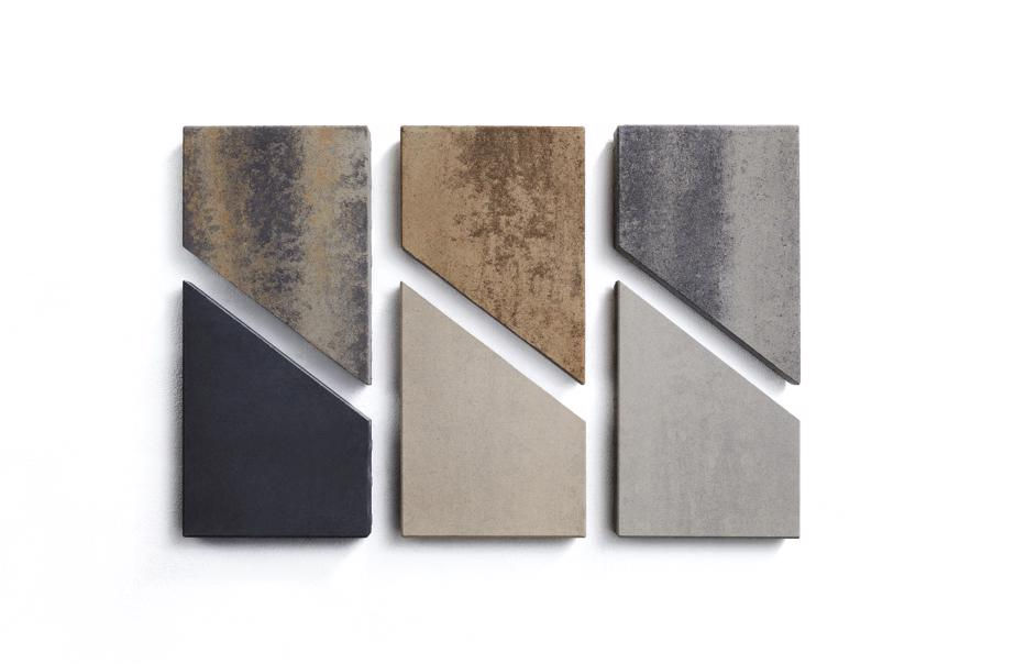 Échantillons de pavés extérieurs aux tons gris et terreux.